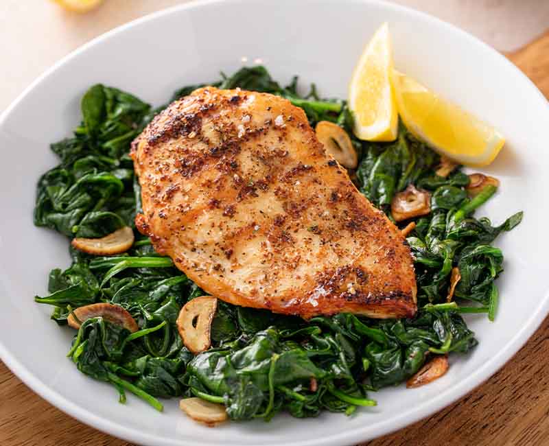 Best Grilled Chicken Cutlets w/ Spinach Garlic & Oil in brooklyn